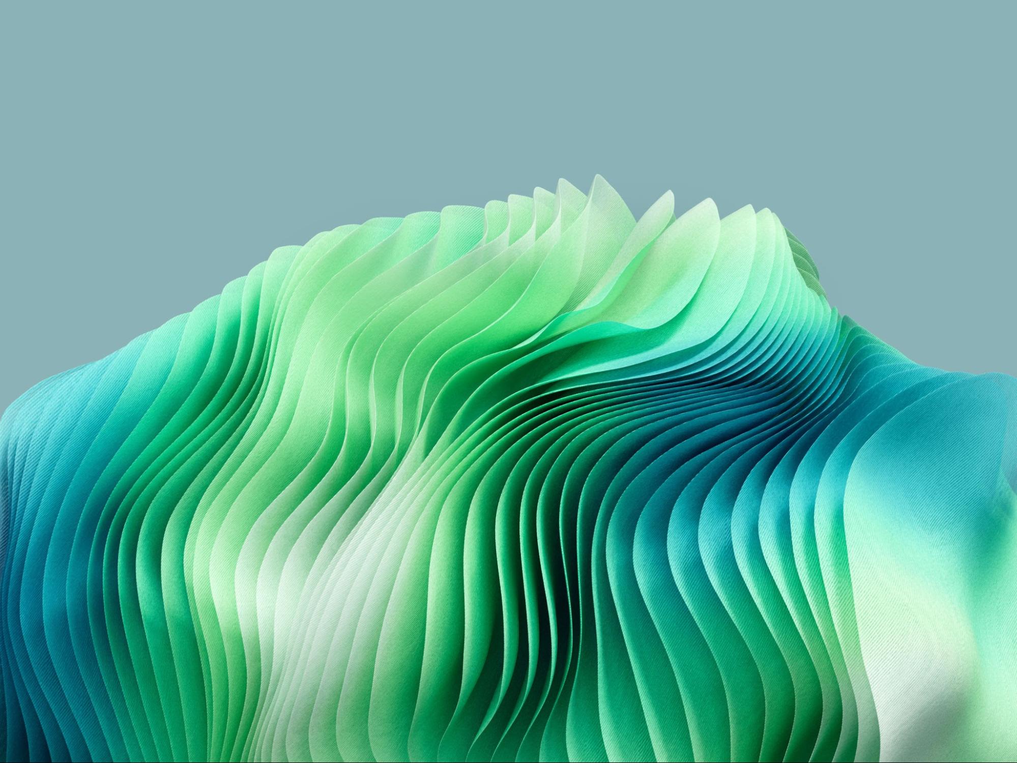 An abstract image of thin green and blue sheets